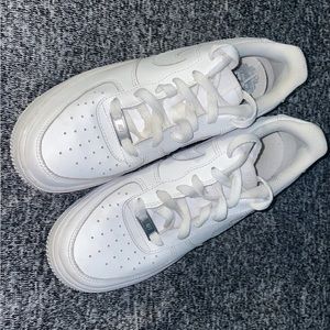 All white Nike Air Force 1s